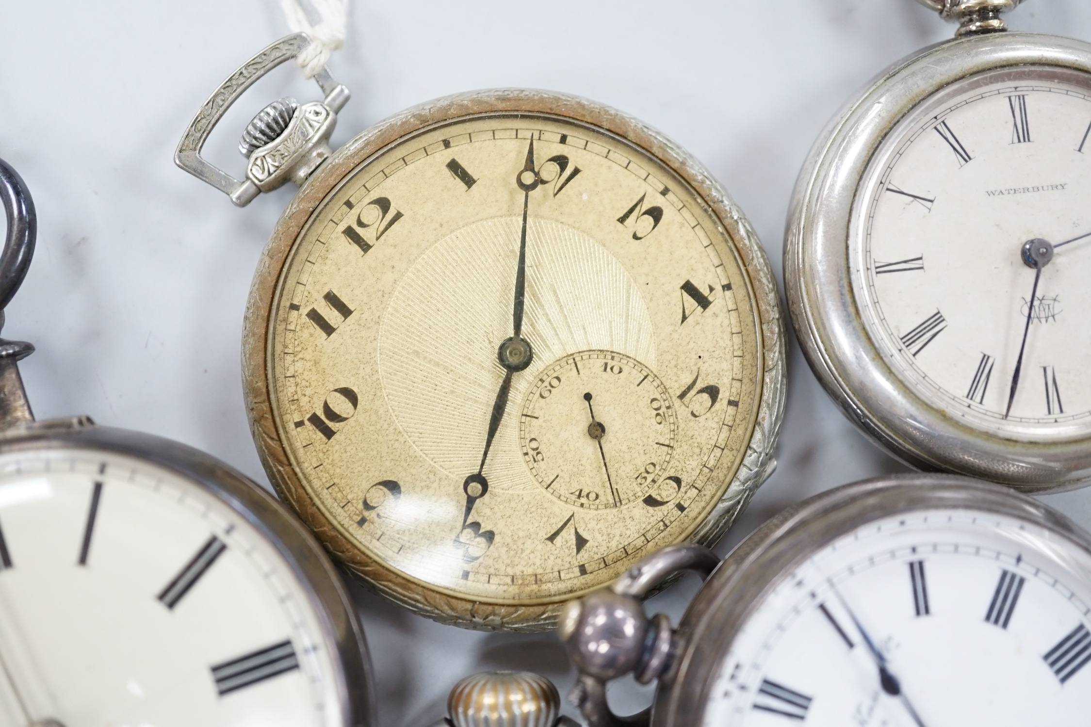 Ten assorted base metal pocket watches including two Goliath one by Bishop of Bournemouth.